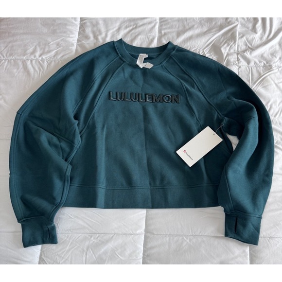 lululemon athletica Tops - New Lululemon Scuba Oversized Word Logo Pullover Size M/L Teal Logo NWT